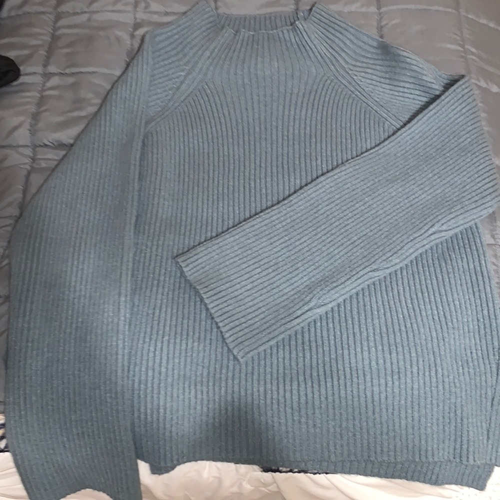 It’s a new day sweater LIKE NEW